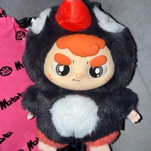 Matata Chaos Campus Vinyl Plush Pendant - Waxing Eloquent Parrot